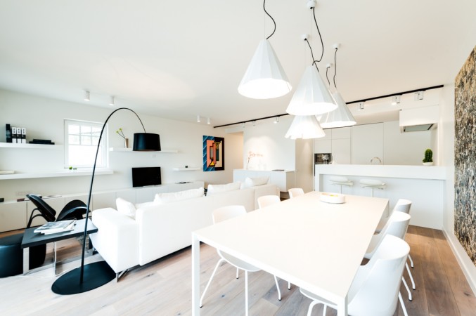 Modelappartement - Zicht op zithoek - keuken